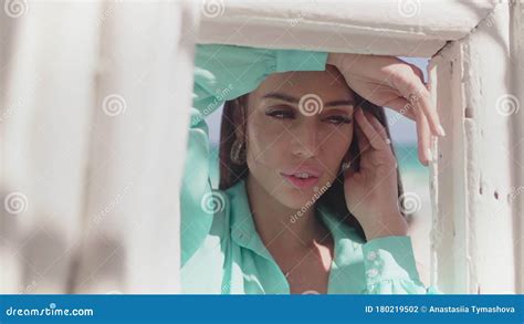 Beautiful Brunette Posing For The Camera In A Beach Club Stock Footage