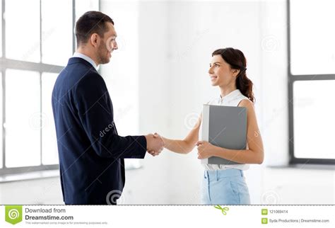 Businesswoman And Businessman Shake Hands Stock Photo Image Of