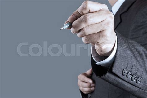 Businessman Hand Writing In The Whiteboard Stock Image Colourbox
