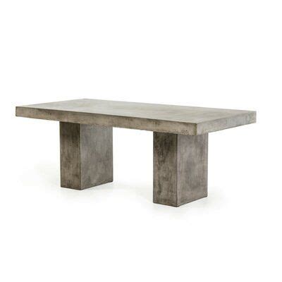 Pouf and coffee table thought up for versatile mixing and matching with other products ethimo. Orren Ellis Quitman Dining Table in 2020 | Concrete dining ...