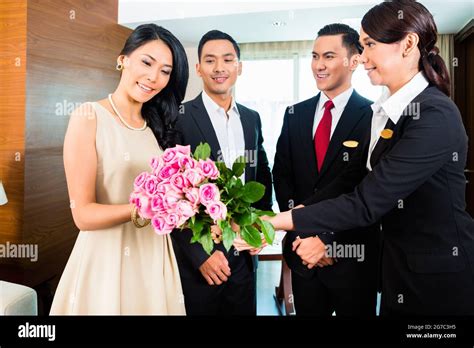 Friendly Staff Greeting Guests In Hotel Stock Photo Alamy