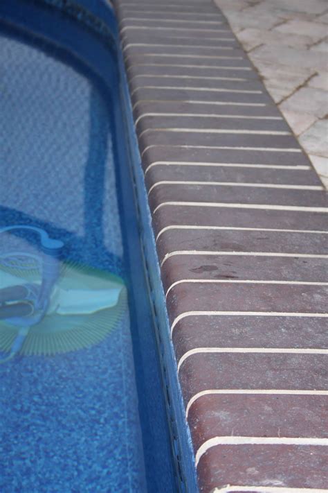 Most popular finishes for natural stone copings are flamed, or stone bullnose pool coping. Bullnose Brick Coping - UV Pools