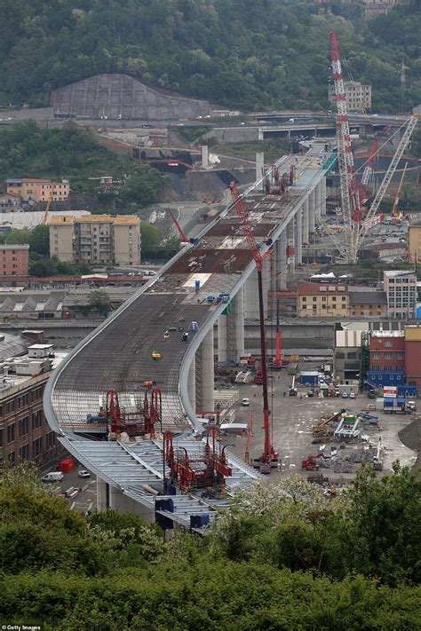 Quick & easy purchase process. Final section of new Genoa bridge slots into place two ...
