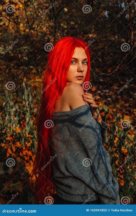 Beautiful Redhead Girl With Long Strong And Thick Hair Perfect Woman Portrait On A Background