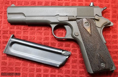 Colt 1911 Ace 22lr Parkerized With One Magazine And Wartime Grips