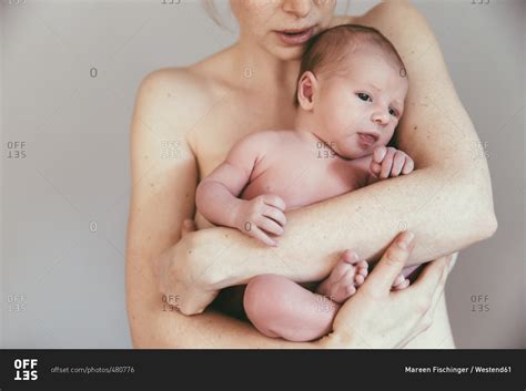 Nude Mother Holding Her Newborn Baby Stock Photo Offset