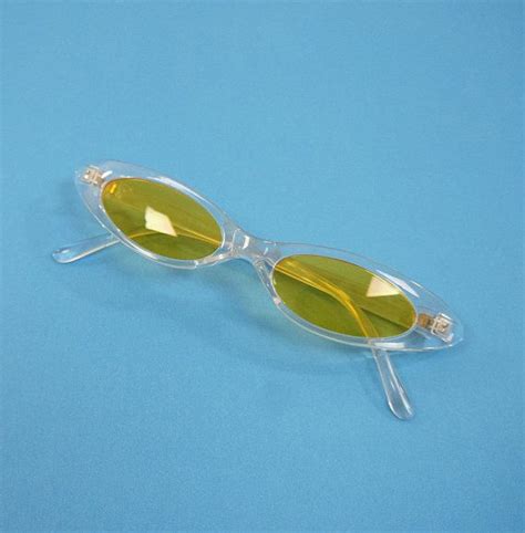 slim oval late 90s 00s clear skinny sunglasses yellow lens sunglasses pointed cat eye style