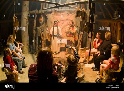 Native American Indians In An Earth Lodge At The On A Slant Village At