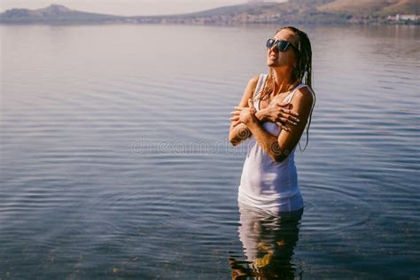 A Girl Is Freezing In A Cold Lake Stock Photo Image Of Cute Adult