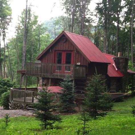 A pristine stream flows right through the campground, churning with salmon in season. Bear Creek Cabins | House exterior, Exterior paint color ...