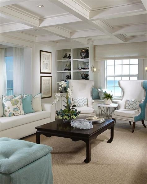 this living room boasts a traditional take on coastal style the crisp blue and w… living room