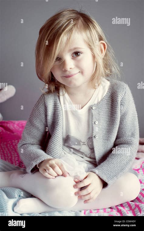 Little Girl Sitting Portrait Stock Photo Alamy