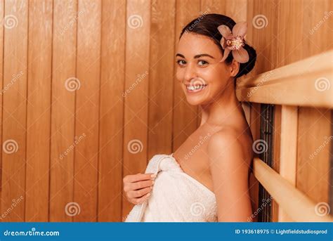 Woman In Towel With Flower In Hair In Sauna Stock Image Image Of