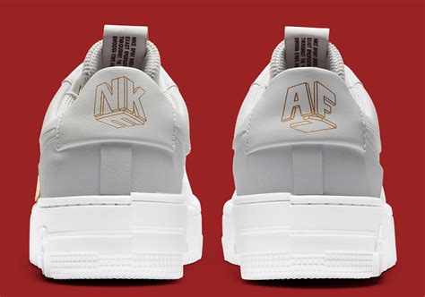 Adding some nice pop to the shoe are the gold contrasting accents noted on the dimensional nike branding on the tongues, heels, and insoles. Nike WMNS Air Force 1 Low Pixel ''Grey Gold Chain ...
