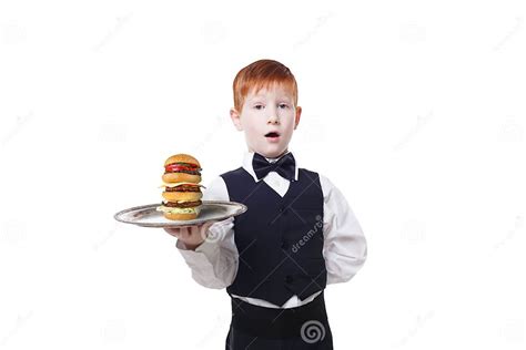 Little Boy Waiter Stands With Tray Serving Hamburger Stock Image