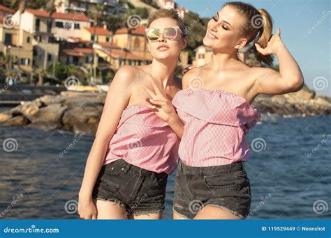 Portrait Of Two Smiling Girls Posing Outdoor Stock Image Image Of Beauty Love