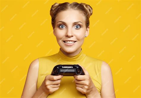 Premium Photo Portrait Of Gorgeous Happy Blonde Gamer Girl Playing