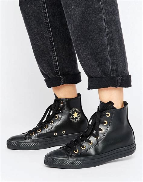 Gold converse sneakers first surfaced on chictopia's streetstyle gallery in fall 2011 seen on bromley blogger rainbowsandfairydust of rainbowsandfairydust.blogspot.com. Converse Chuck Taylor Hi Top Sneakers In Black With Gold Eyelets - Lyst