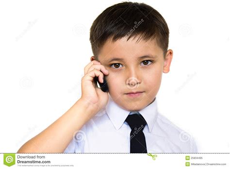 Un Muchacho Que Habla En El Teléfono Imagen De Archivo Imagen De