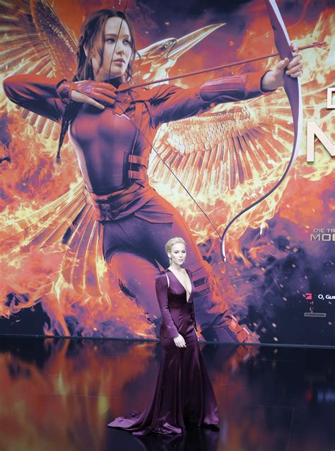 Actress jennifer lawrence walked the red carpet, and signed autographs. Jennifer Lawrence Removed From Hunger Games Posters in ...