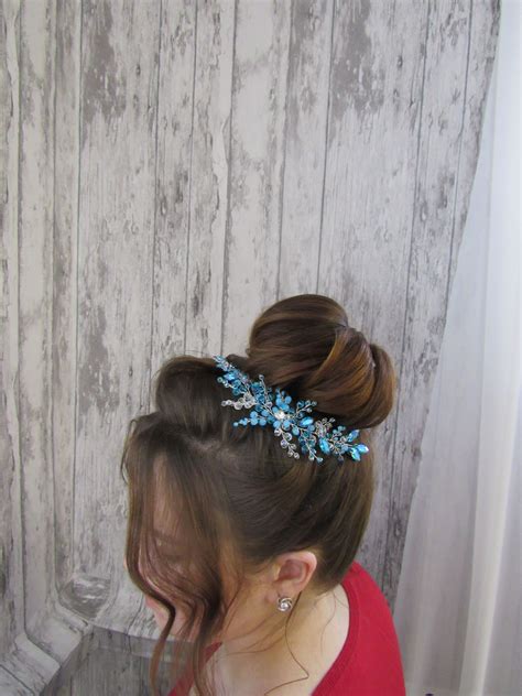 The emmy london hair decoration collection consists of an array of different bridal styles, inspired by flowers, architecture and the romantic art deco era. Blue wedding hair piece Bridal jewerely Tiara Wedding hair ...