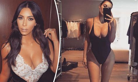Kim Kardashian Displays Cleavage In Barely There Bodysuit