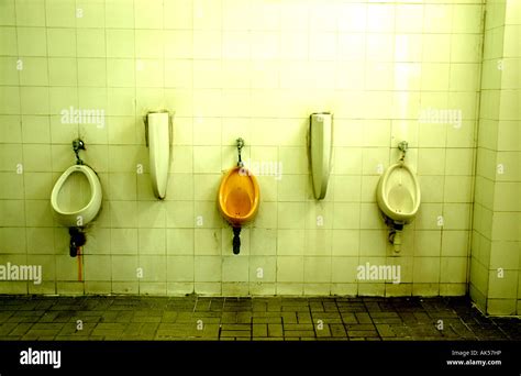 Three Dirty Urinals In A Public Toilet Stock Photo Alamy