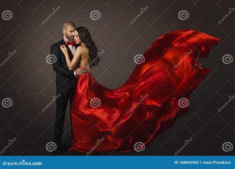 Couple Beauty Portrait Beautiful Woman Dancing In Red Dress And Elegant Man Fluttering Gown