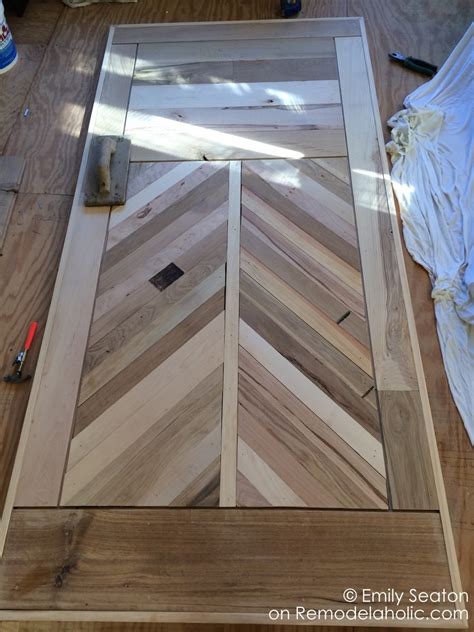 Many bedrooms include additional doorways leading into bathrooms or closets. How to Build a Wood Chevron Barn Door | Remodelaholic ...