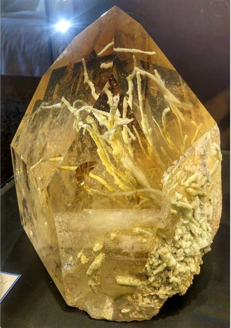 Large Smoky Quartz Crystal With Inclusions Of Apatite Crystals That Formed In Worm Like Shapes
