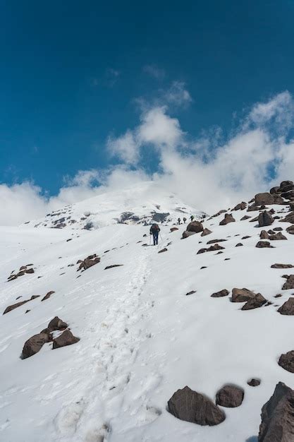 Premium Photo Mountaineer Climbing The Chimborazo Volcano In Ecuador