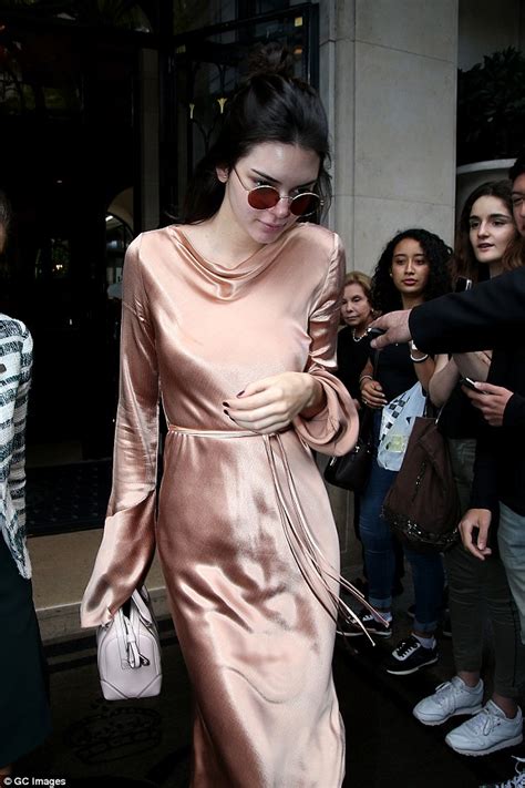Braless Kendall Jenner Shows Off Her Nipple Piercing In A Pink Satin