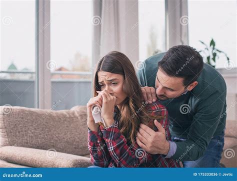 Boyfriend Consoling Crying Girl At Home Stock Photo Image Of Emotion