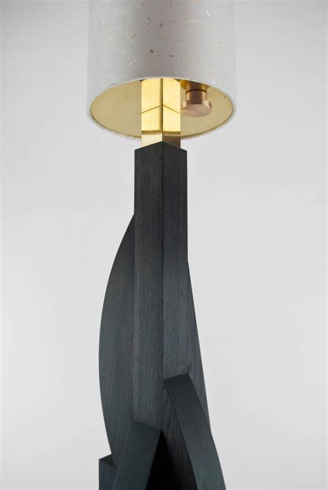 You can find this lamp in three. Contemporary Tower Floor Lamp with Geometric Oak Base and ...