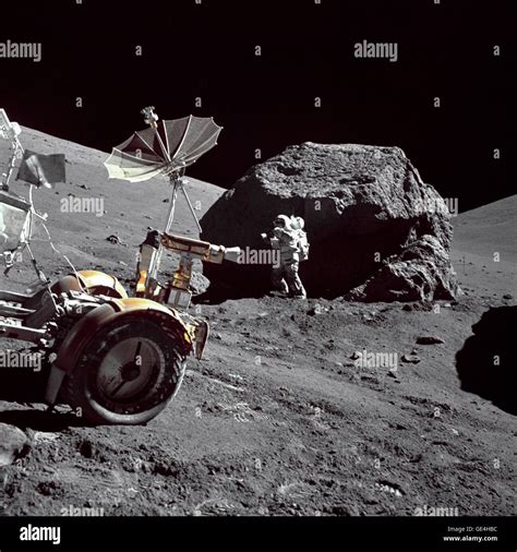 Geologist Astronaut Harrison H Schmitt Is Photographed Standing Next