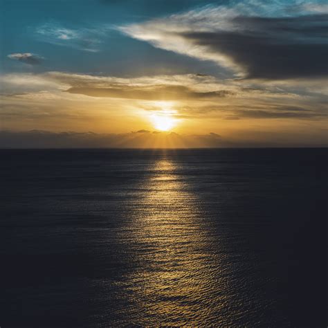 Download Wallpaper 2780x2780 Sea Sunset Sun Horizon Ripples Waves