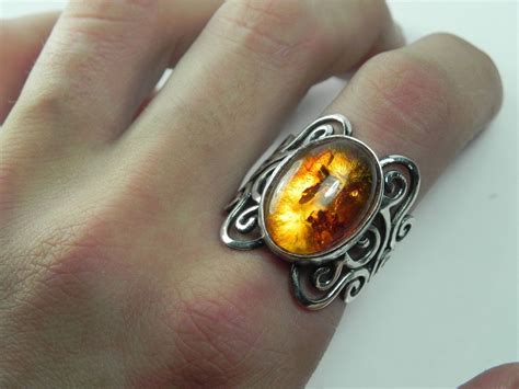 I recently visited your jewelry exchange store in tustin and was very impressed with your selection. Amber Ring - Baltic Amber Swirl Ring - Unique Silver Amber ...