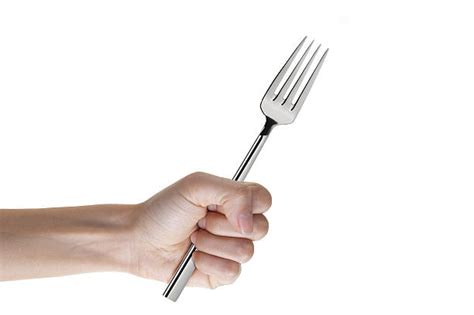 Hand Fist Fork Stock Photos Pictures And Royalty Free Images Istock