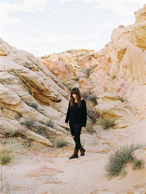 Young Woman Walking In Desert By Stocksy Contributor Daniel Kim