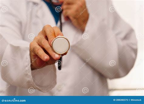 Close Up Of A Doctor Holding A Stethoscope In His Hand Stock Image