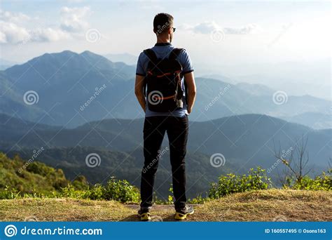 Tourist Guy Stands On The Edge Of The Mountains In Thailand Stock Image