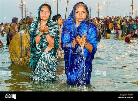 People Taking Bath Early Morning At The Sangam The Confluence Of The
