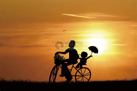 夕阳下骑车父子剪影图片素材 正版创意图片500945899 摄图网