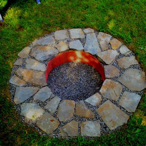 The easiest way to create a backyard bonfire. Another outdoor fire pit. Neat idea to sink the fire ring ...