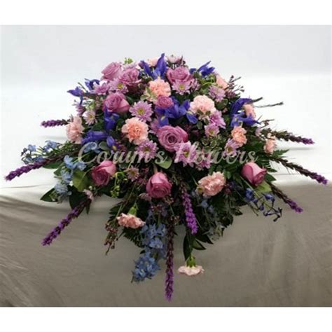 Casket Spray In Lavender Pink And Blue Corums Flowers And Ts