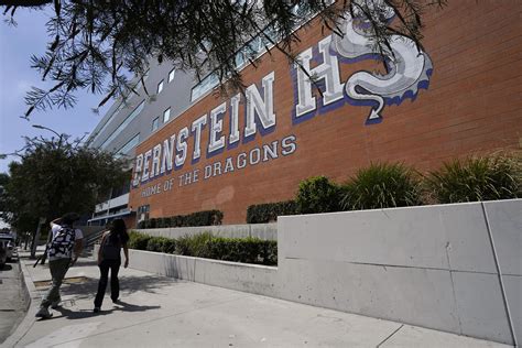 Police: Arrest after teen ODs and dies in school bathroom | AP News