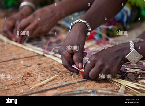 In The Town Of Djibo In Northern Burkina Faso Two Fulani Women Weave A