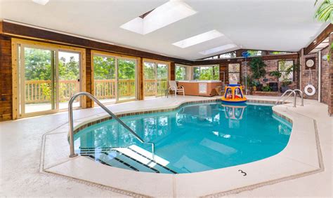 Not only do these cabins come with a swimming pool, they also have other forms of entertainment like pool tables, outdoor fire pits and even theater rooms. Gatlinburg Cabin Rentals - Panorama Point | Gatlinburg ...