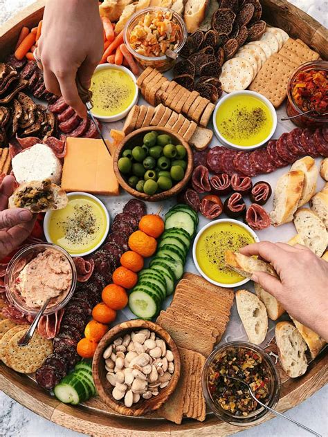 Cheese platters can be simple or elaborate, depending on what type of party you're throwing and how much money you want to spend. How to Make an Epic Charcuterie Board (video!) - Reluctant ...