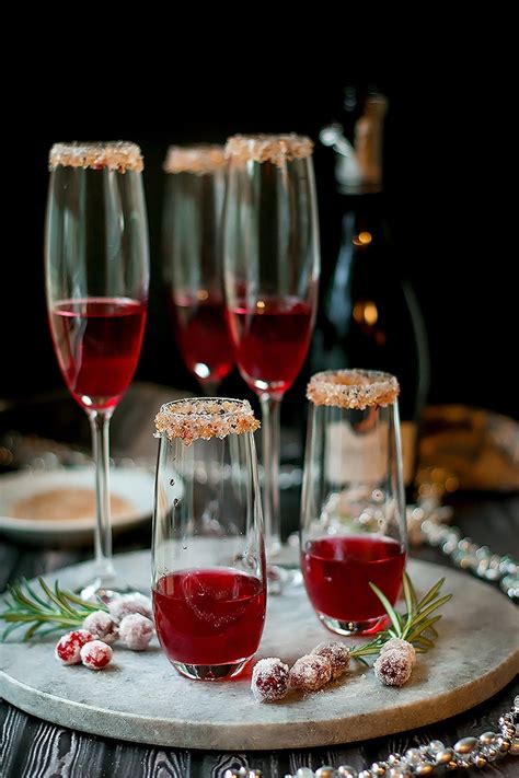 This quick and easy champagne cocktail recipe makes for a simple christmas drink recipe. Cranberry Ginger Sparkling Holiday Cocktail ~ Cooks With Cocktails